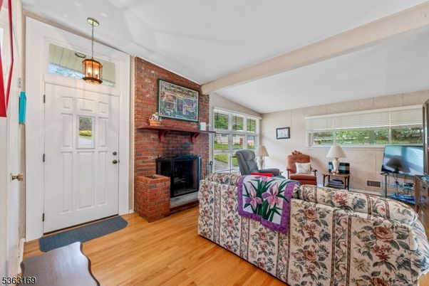 Fireplace, Interior, Living room, Pendant Lights, Stone Walls, Wood Texture Flooring