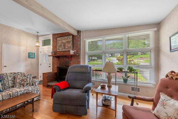 Fireplace, Interior, Living room, Pendant Lights, Stone Walls, Wood Texture Flooring