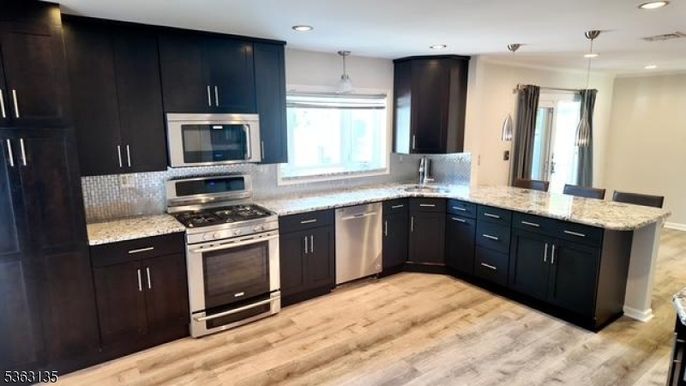 Interior, Kitchen, Pendant Lights, Recessed Lighting, Stainless Steel Appliances, Wood Texture Flooring