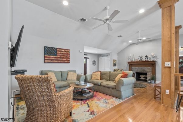 Fireplace, Interior, Living room, Recessed Lighting, Wood Texture Flooring