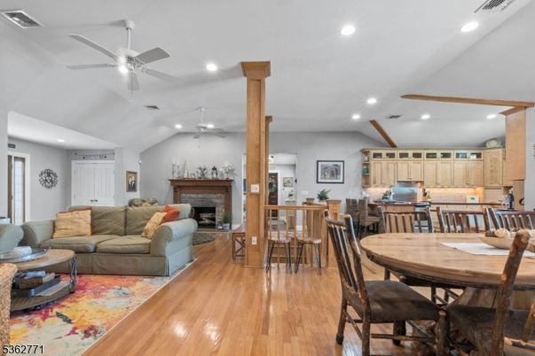 Dining room, Fireplace, Interior, Kitchen, Living room, Recessed Lighting, Wood Texture Flooring