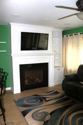 Fireplace, Interior, Recessed Lighting, Wood Texture Flooring
