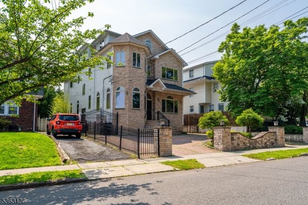 Exterior, Facade, Brick Facade, Queen Anne Victorian
