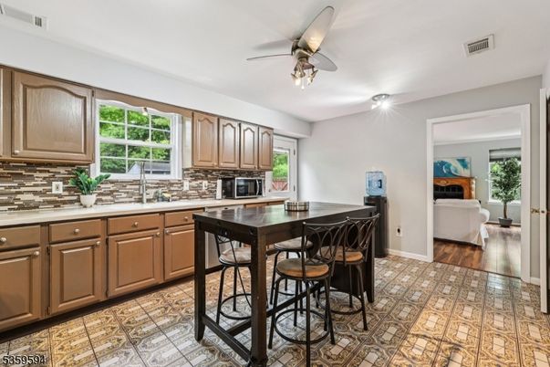 Dining room, Fireplace, Interior, Kitchen, Wood Texture Flooring