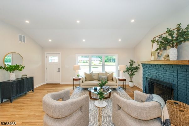 Fireplace, Interior, Living room, Recessed Lighting, Wood Texture Flooring