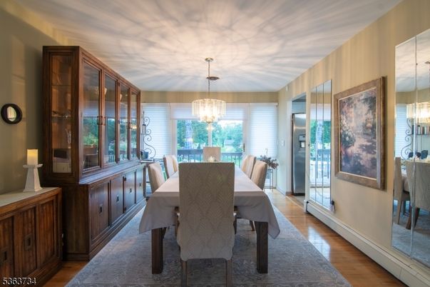 Chandelier, Dining room, Interior, Wood Texture Flooring