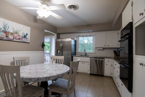 Dining room, Interior, Kitchen, Stainless Steel Appliances, Wood Texture Flooring