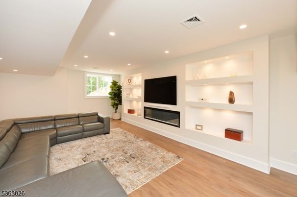 Fireplace, Interior, Living room, Recessed Lighting, Wood Texture Flooring