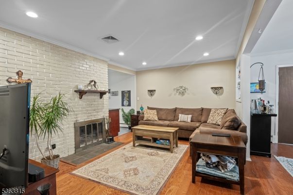 Fireplace, Interior, Living room, Recessed Lighting, Stone Walls, Wood Texture Flooring