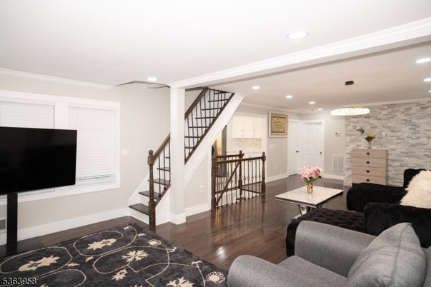 Interior, Living room, Pendant Lights, Recessed Lighting, Stone Walls, Wood Texture Flooring