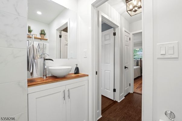 Bathroom, Interior, Marble Walls, Recessed Lighting, Wood Texture Flooring