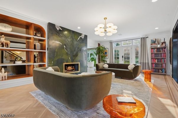Chandelier, Fireplace, Interior, Living room, Recessed Lighting, Wood Texture Flooring
