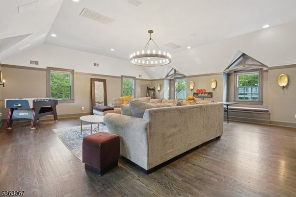 Chandelier, Game Room, Interior, Living room, Recessed Lighting, Wood Texture Flooring