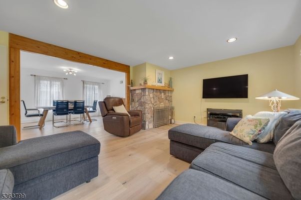 Dining room, Fireplace, Interior, Living room, Recessed Lighting, Wooden Beams, Wood Texture Flooring