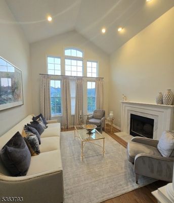 Fireplace, Interior, Living room, Recessed Lighting, Water, Wood Texture Flooring