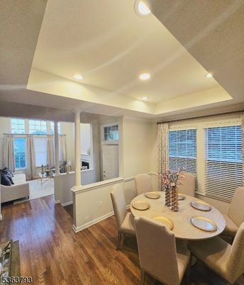 Dining room, Fireplace, Interior, Living room, Recessed Lighting, Wood Texture Flooring