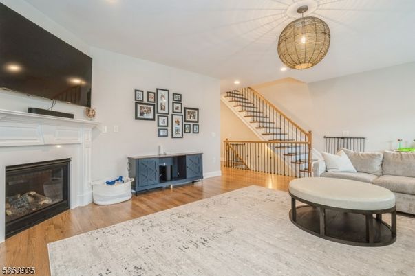 Fireplace, Interior, Living room, Pendant Lights, Recessed Lighting, Wood Texture Flooring
