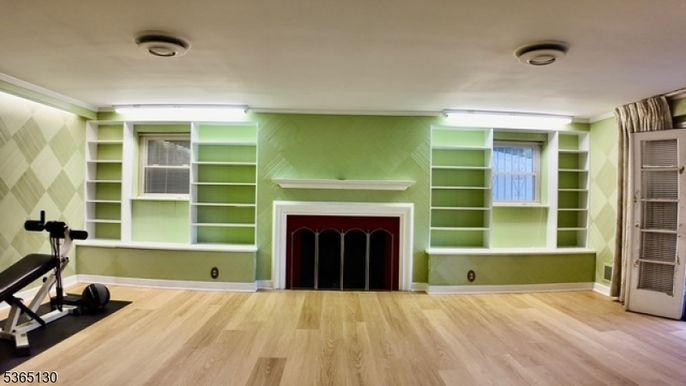 Fireplace, Fitness Equipment, Interior, Wood Texture Flooring