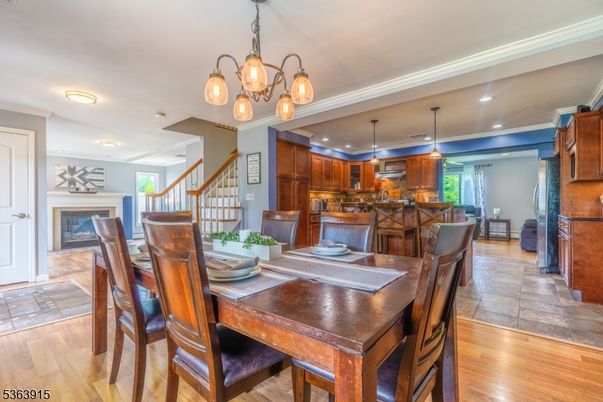 Dining room, Fireplace, Interior, Kitchen, Pendant Lights, Recessed Lighting, Wood Texture Flooring