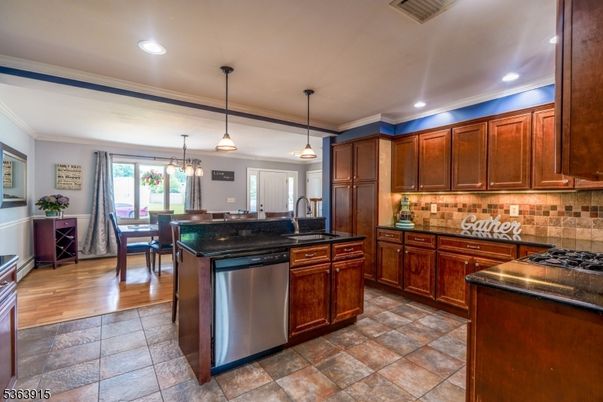 Dining room, Interior, Kitchen, Pendant Lights, Recessed Lighting, Stainless Steel Appliances, Wood Texture Flooring