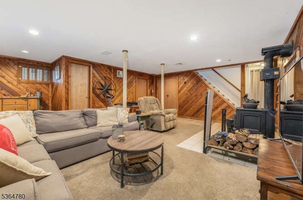 Fireplace, Interior, Living room, Recessed Lighting, Wood Texture Flooring, Wooden Walls