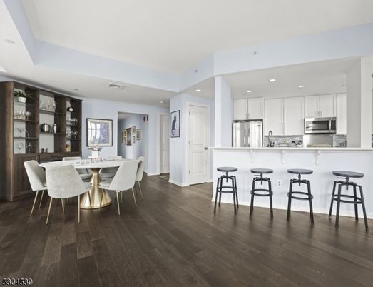 Dining room, Interior, Kitchen, Recessed Lighting, Stainless Steel Appliances, Wood Texture Flooring