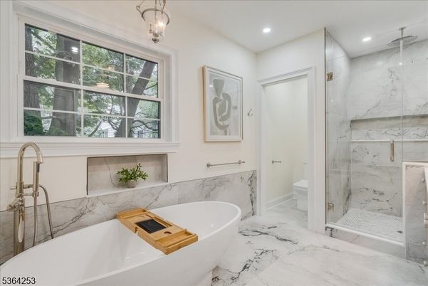 Bathroom, Free Standing Baths, Glass Shower, Interior, Marble, Marble Walls, Recessed Lighting