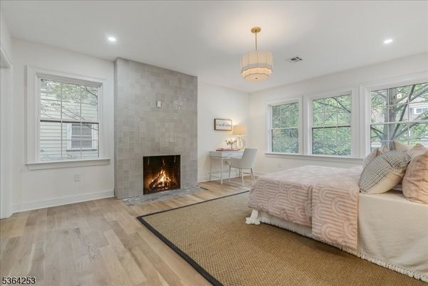 Bedroom, Fireplace, Home Office, Interior, Pendant Lights, Recessed Lighting, Wood Texture Flooring