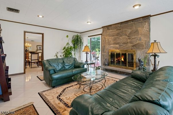 Dining room, Fireplace, Interior, Living room, Recessed Lighting, Stone Walls