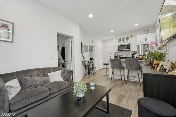 Interior, Kitchen, Living room, Recessed Lighting, Stainless Steel Appliances, Wood Texture Flooring