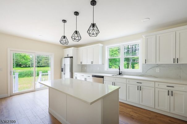 Interior, Kitchen, Marble Walls, Pendant Lights, Recessed Lighting, Wood Texture Flooring