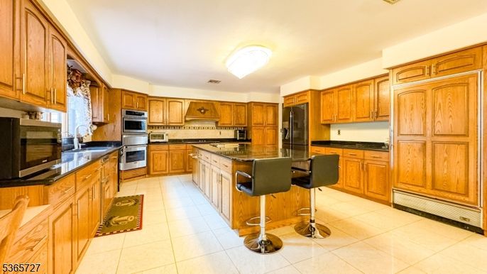 Interior, Kitchen, Stainless Steel Appliances, Tile Countertops