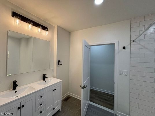Bathroom, Dual Sink Vanities, Interior, Recessed Lighting, Wood Texture Flooring