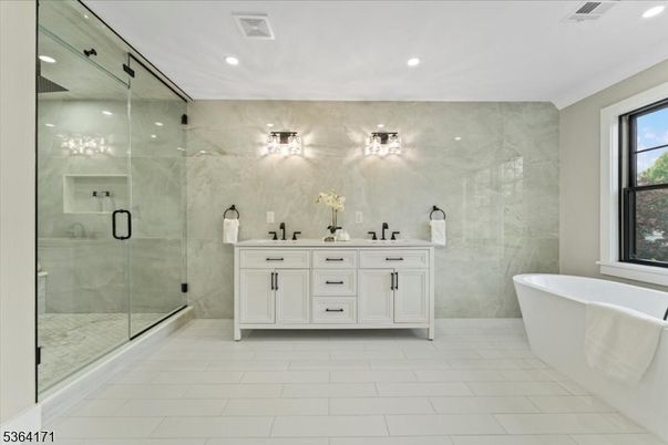 Bathroom, Dual Sink Vanities, Free Standing Baths, Glass Shower, Interior, Marble Walls, Recessed Lighting