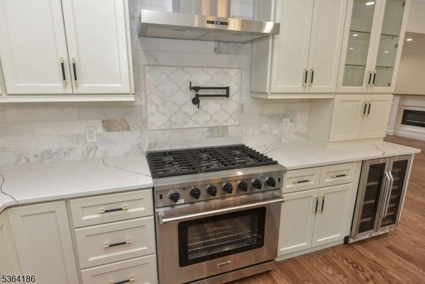 Interior, Kitchen, Marble Walls, Stainless Steel Appliances, Wood Texture Flooring