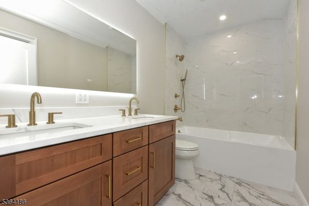 Bathroom, Dual Sink Vanities, Interior, Marble, Marble Walls, Recessed Lighting