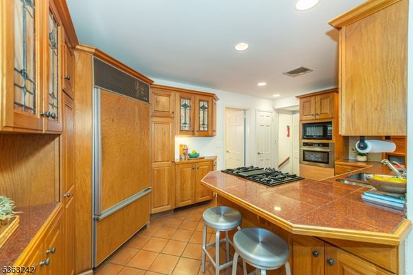 Interior, Kitchen, Recessed Lighting, Tile Countertops