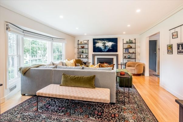 Fireplace, Interior, Living room, Recessed Lighting, Wood Texture Flooring