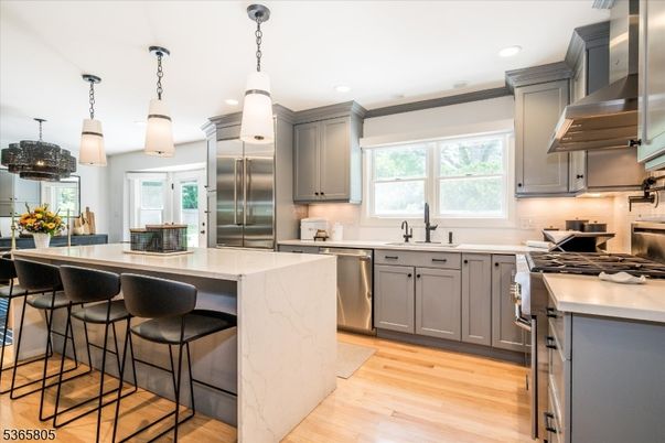 Interior, Kitchen, Pendant Lights, Recessed Lighting, Stainless Steel Appliances, Wood Texture Flooring