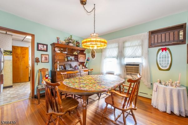 Dining room, Interior, Pendant Lights, Wood Texture Flooring