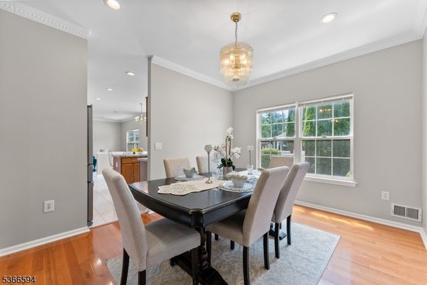 Chandelier, Dining room, Interior, Pendant Lights, Recessed Lighting, Wood Texture Flooring