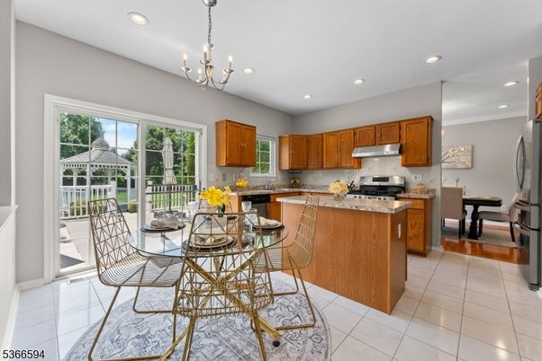 Chandelier, Dining room, Interior, Kitchen, Recessed Lighting, Stainless Steel Appliances