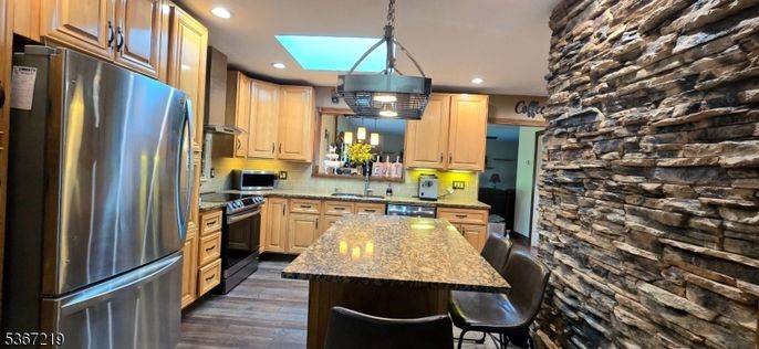 Interior, Kitchen, Pendant Lights, Recessed Lighting, Stainless Steel Appliances, Stone Walls, Wood Texture Flooring