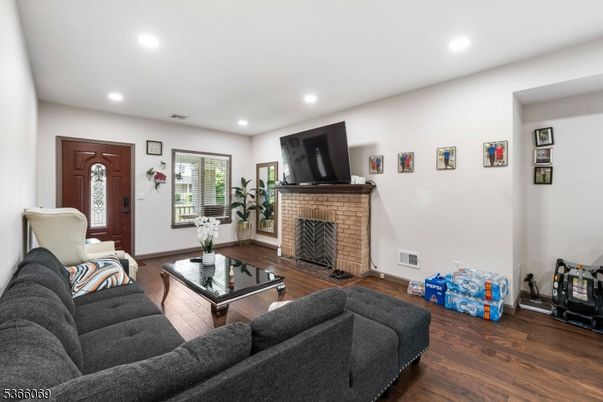 Fireplace, Interior, Living room, Recessed Lighting, Wood Texture Flooring