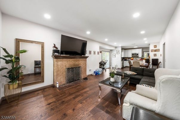 Dining room, Fireplace, Interior, Kitchen, Living room, Recessed Lighting, Wood Texture Flooring
