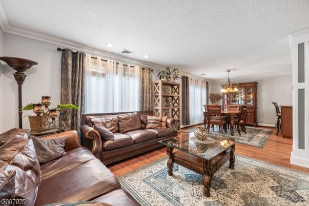 Chandelier, Dining room, Interior, Living room, Recessed Lighting, Wood Texture Flooring
