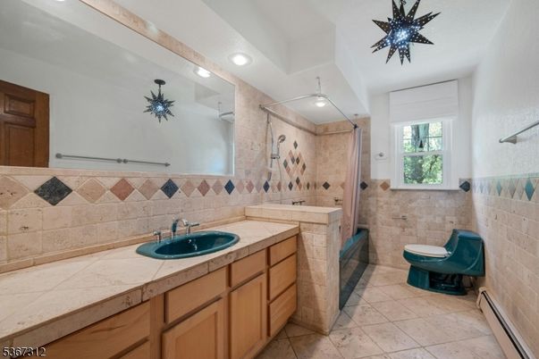 Bathroom, Dual Sink Vanities, Glass Shower, Interior, Recessed Lighting, Tile Countertops