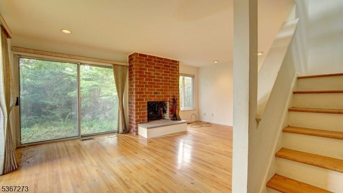 Empty room, Fireplace, Interior, Recessed Lighting, Wood Texture Flooring