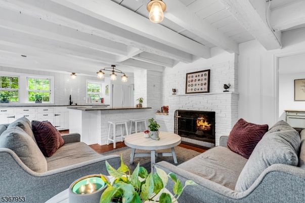 Fireplace, Interior, Living room, Pendant Lights, Stone Walls, Wood Texture Flooring
