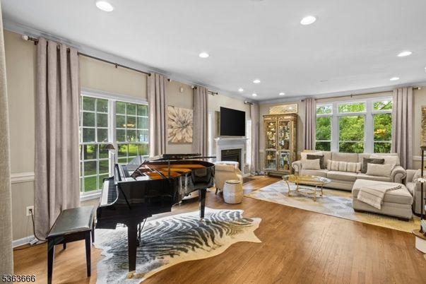 Fireplace, Interior, Living room, Piano, Recessed Lighting, Wood Texture Flooring